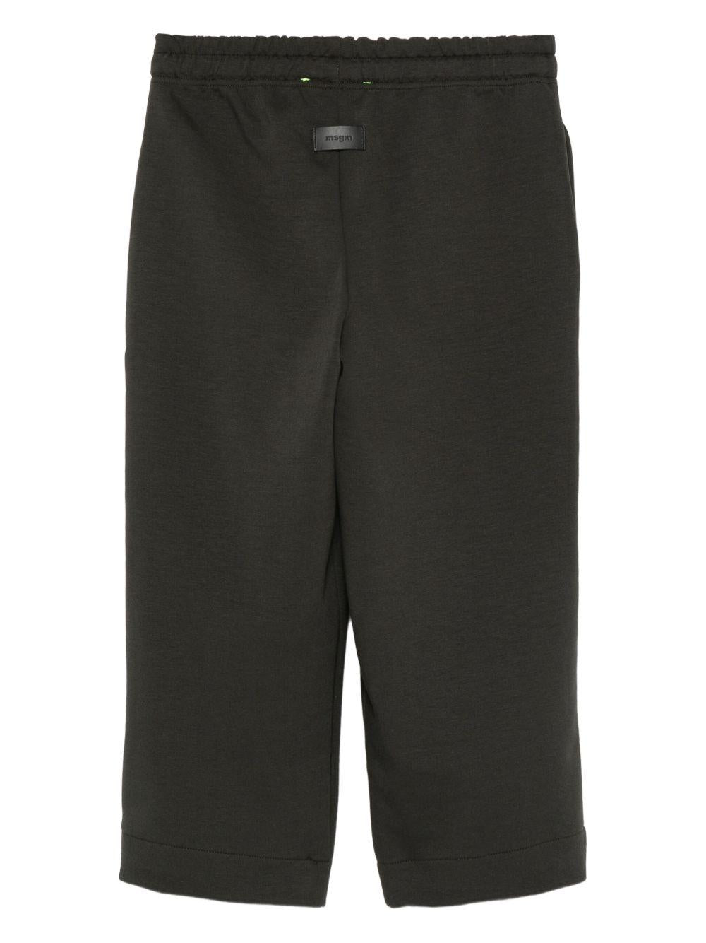 Pantaloni per bambino MSGM Kids neri con stampa del logo - Rubino Kids