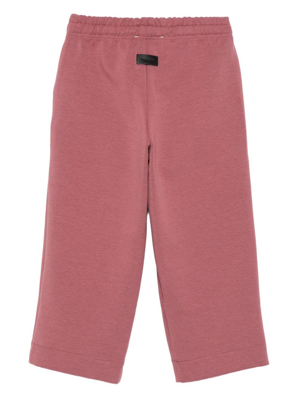 Pantaloni per bambino MSGM KIds rosso con stampa del logo - Rubino Kids