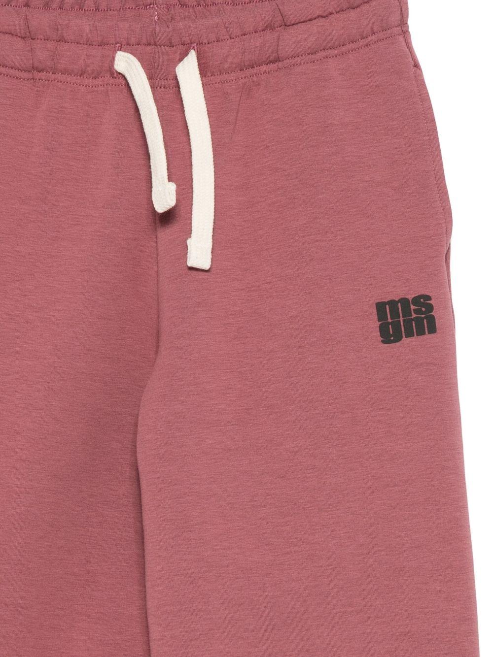 Pantaloni per bambino MSGM KIds rosso con stampa del logo - Rubino Kids