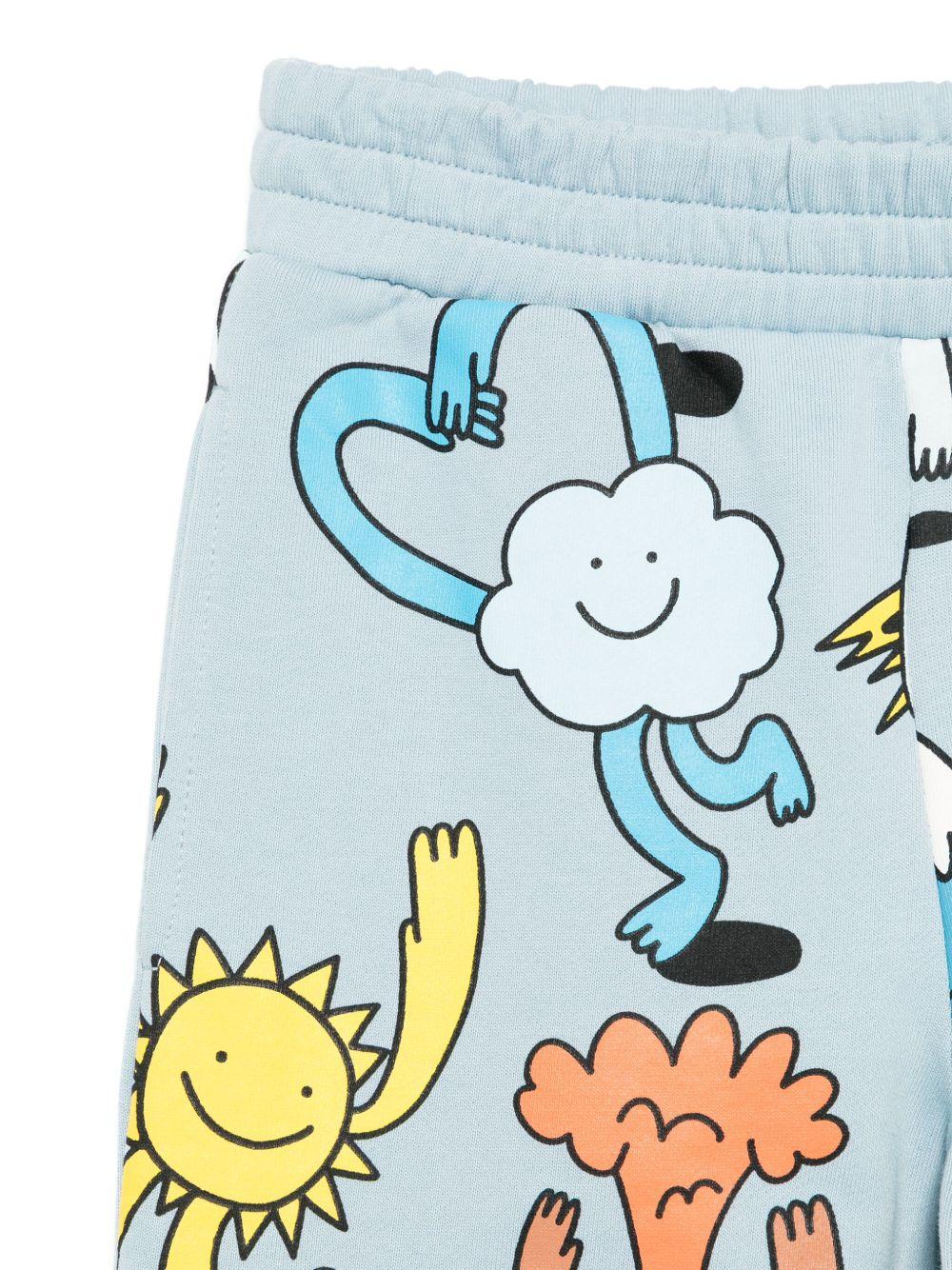 Pantaloni per bambino Stella McCartney Kids azzurro con stampa grafica - Rubino Kids