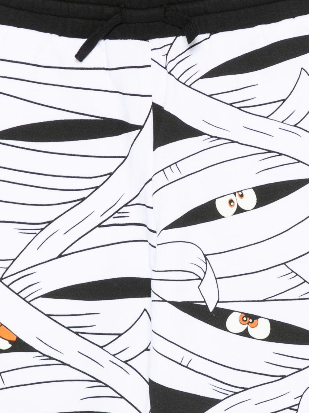 Pantaloni per bambino Stella McCartney Kids bianchi con stampa mummia - Rubino Kids