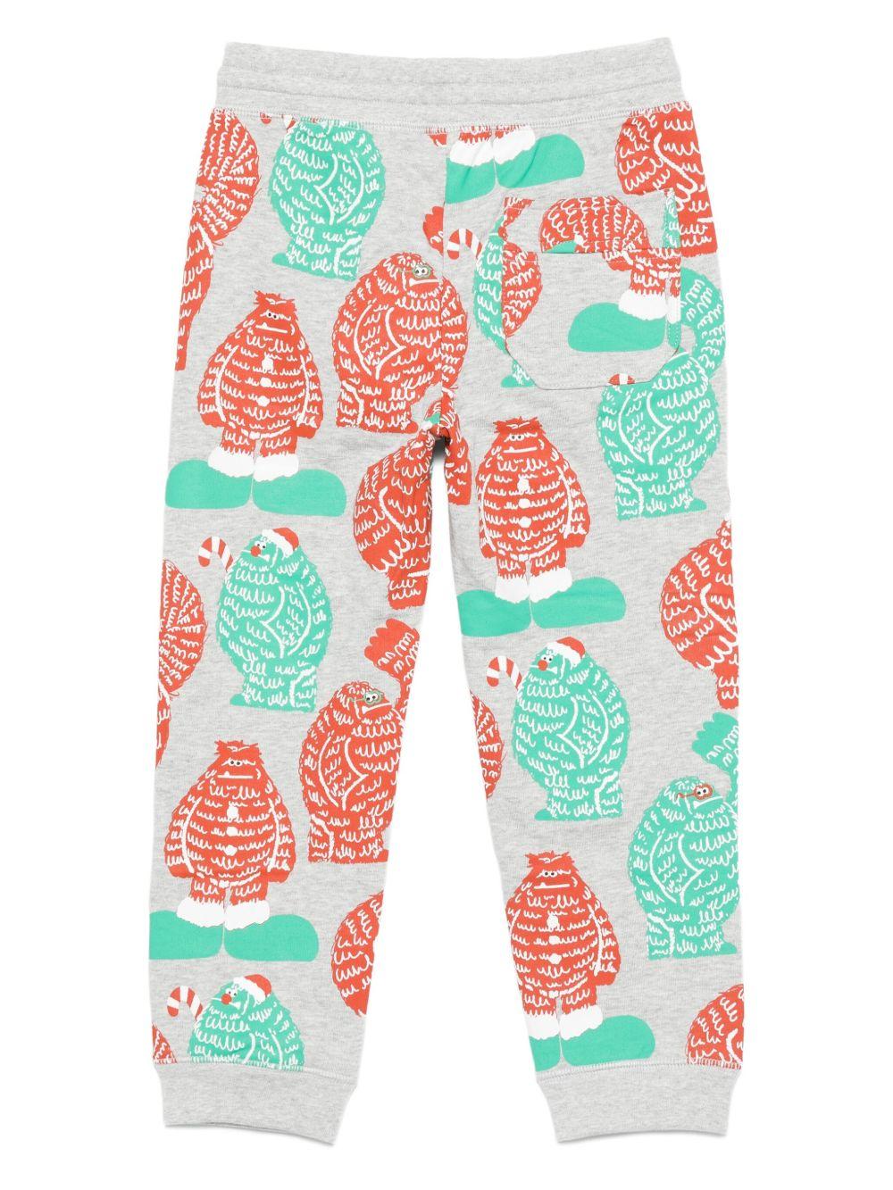 Pantaloni per bambino Stella McCartney Kids grigi con stampa mostro - Rubino Kids