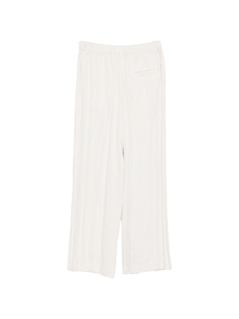 Pantaloni per donna Alysi beige con design plissettato - Rubino Kids