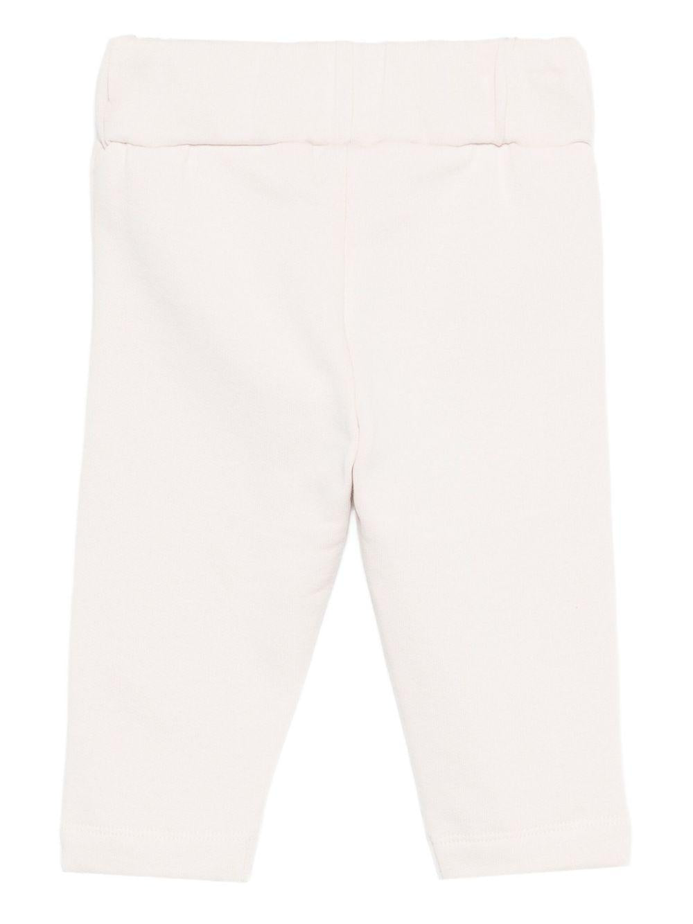 Pantaloni per neonata Donsje bianchi con motivo unicorno - Rubino Kids