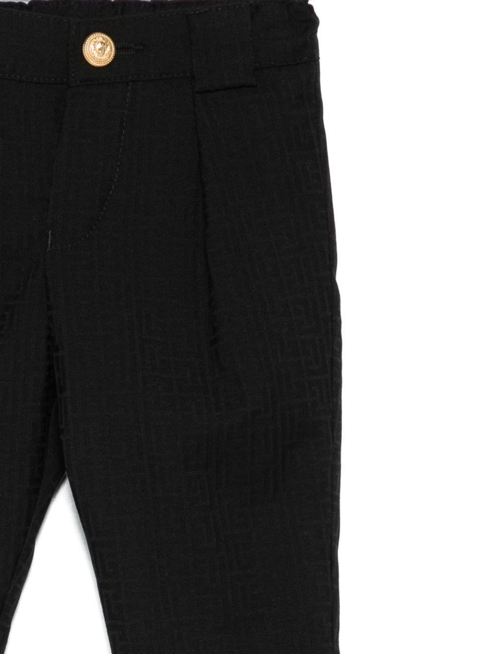 Pantaloni per neonato Balmain Kids neri con motivo logo - Rubino Kids