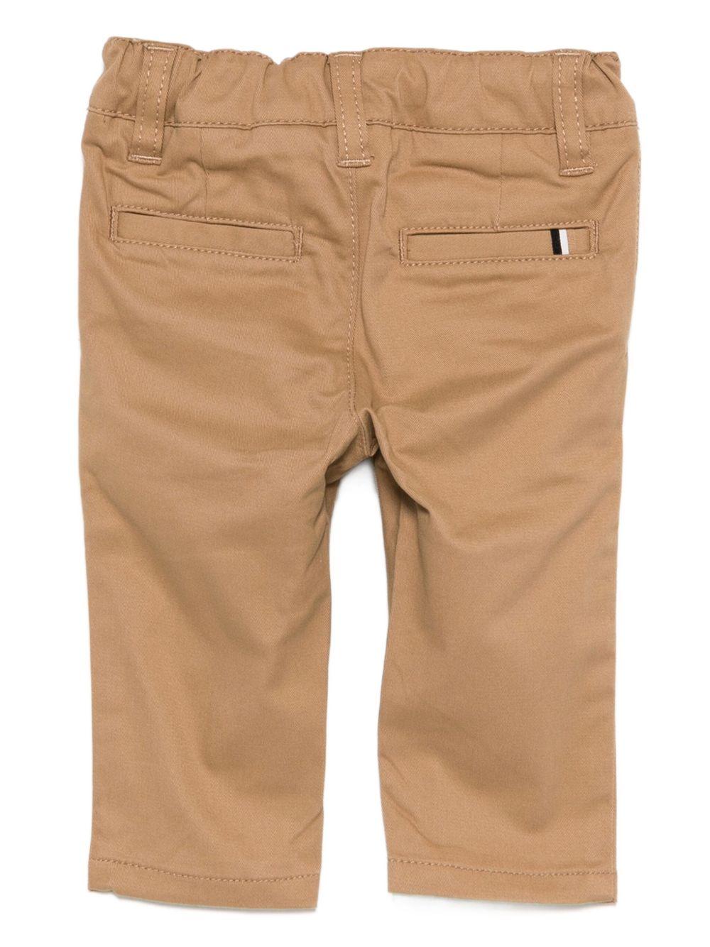 Pantaloni per neonato BOSS Kids beige con tasche posteriori - Rubino Kids