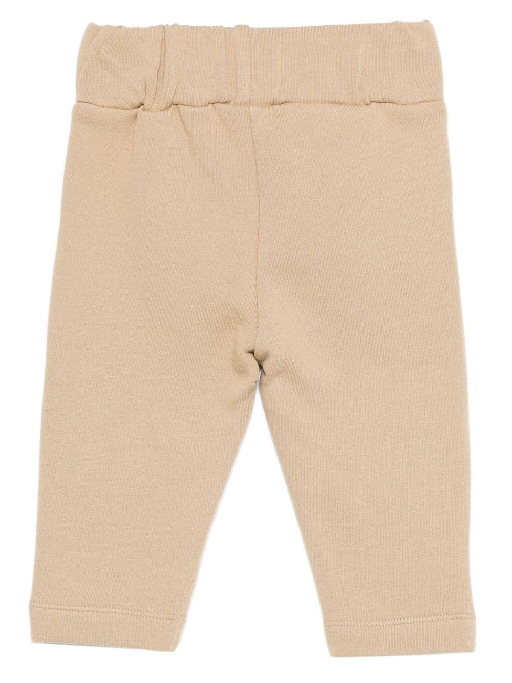 Pantaloni per neonato Donsje beige con ricamo orso - Rubino Kids