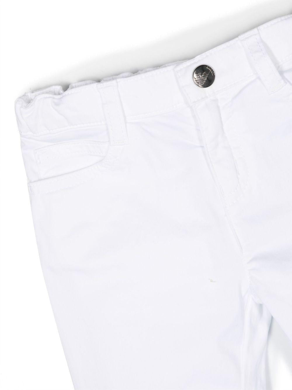 Pantaloni per neonato Emporio Armani Kids bianchi con logo ricamato sul retro - Rubino Kids