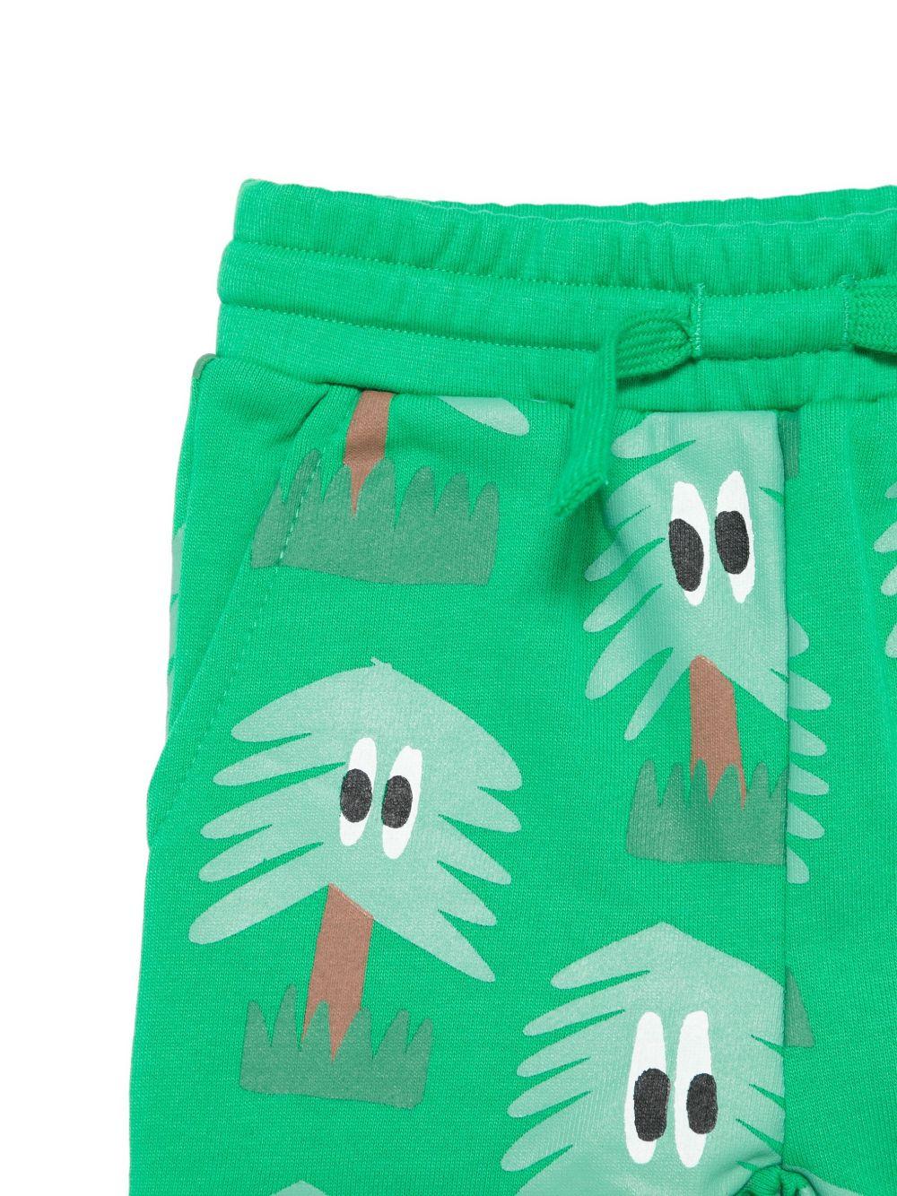 Pantaloni per neonato Stella McCartney Kids verde con coulisse e stampa - Rubino Kids