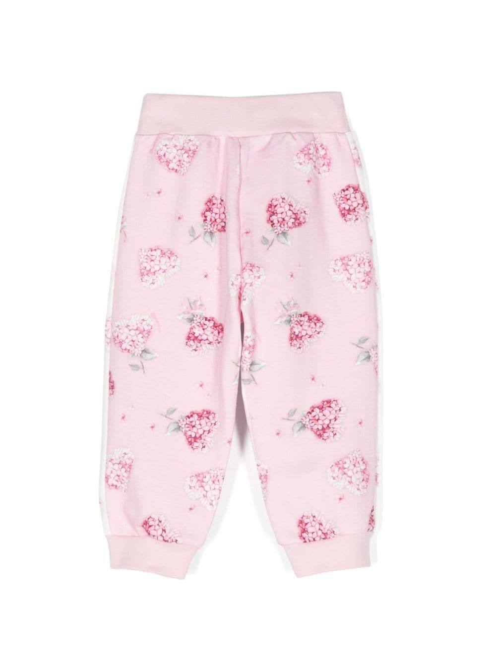 Pantaloni sportivi a fiori per neonata Monnalisa rosa con gamba affusolata - Rubino Kids