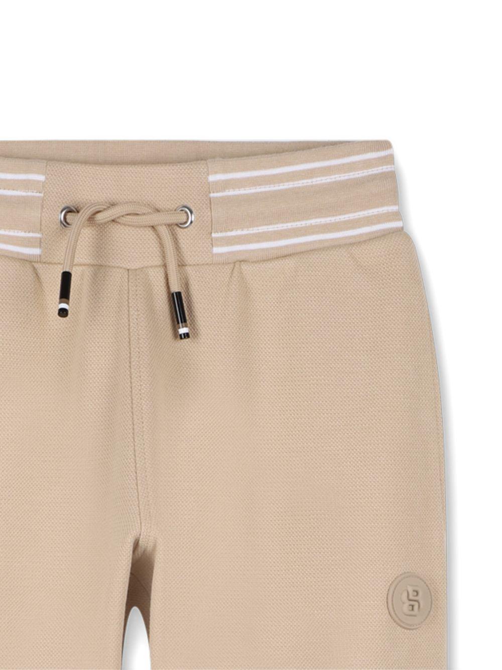 Pantaloni sportivi da bambino Boss Kids beige con stampa logo - Rubino Kids