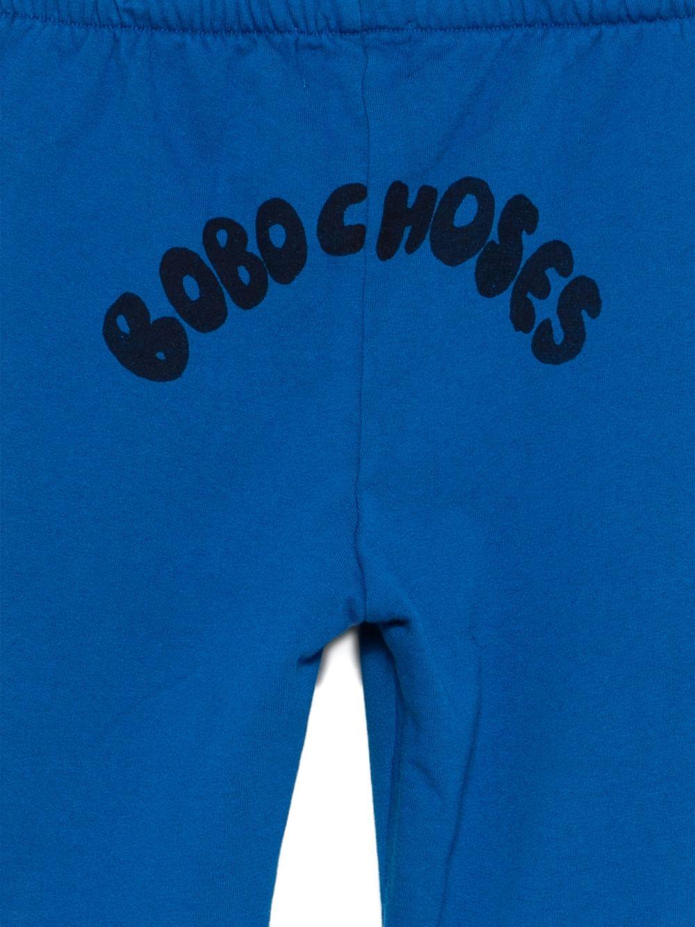 Pantaloni sportivi per bambino Bobo Choses blu con logo stampato sul retro - Rubino Kids