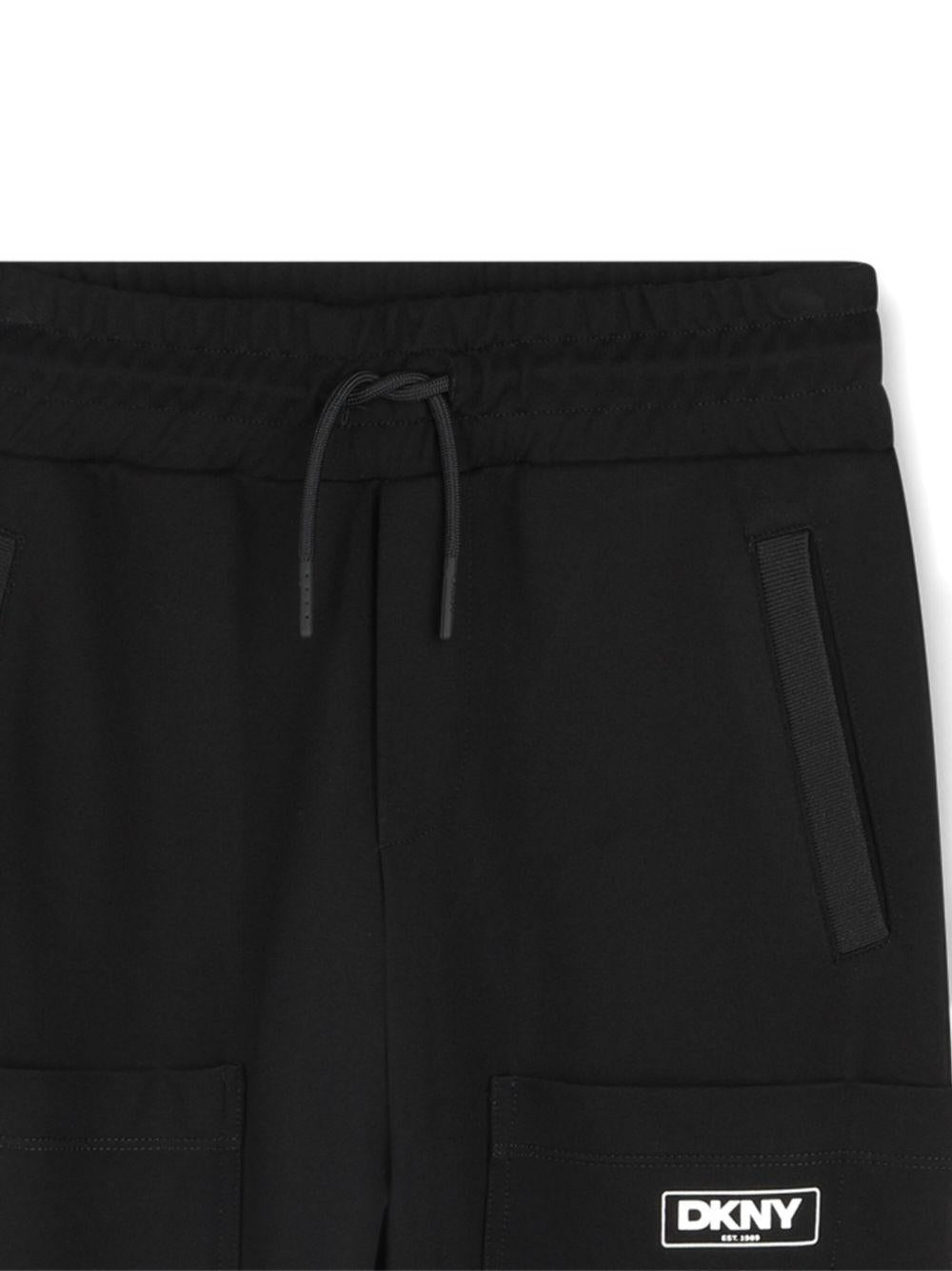 Pantaloni sportivi per bambino Dkny Kids nero con tasche - Rubino Kids