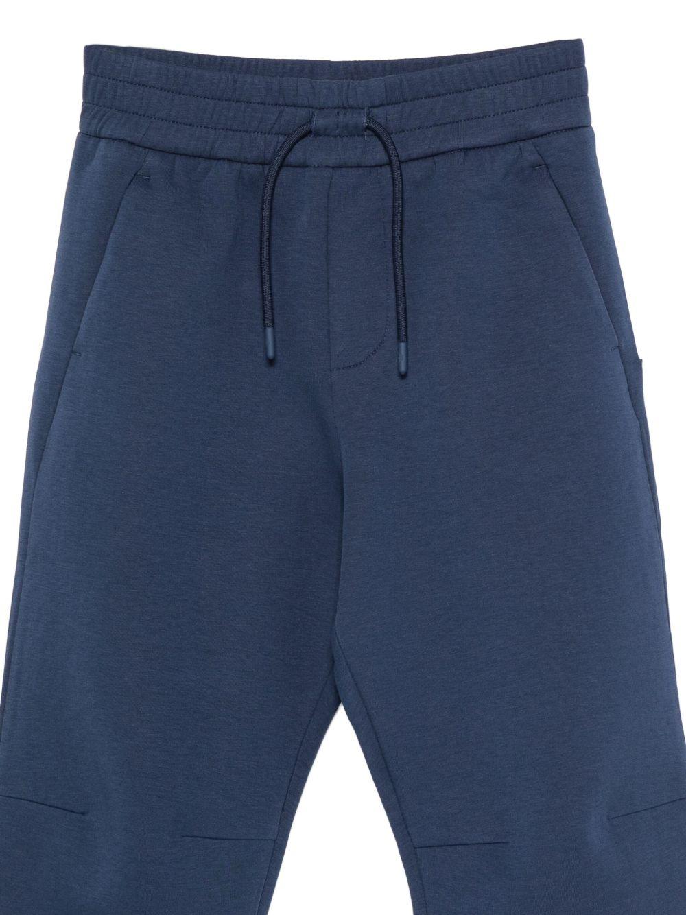 Pantaloni sportivi per bambino Emporio Armani Kids blu con logo - Rubino Kids