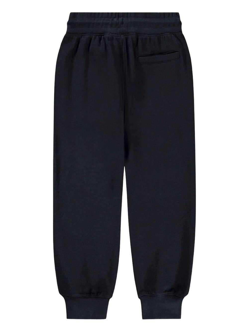 Pantaloni sportivi per bambino Molo Alvar nero con orli alle caviglie elasticizzati - Rubino Kids