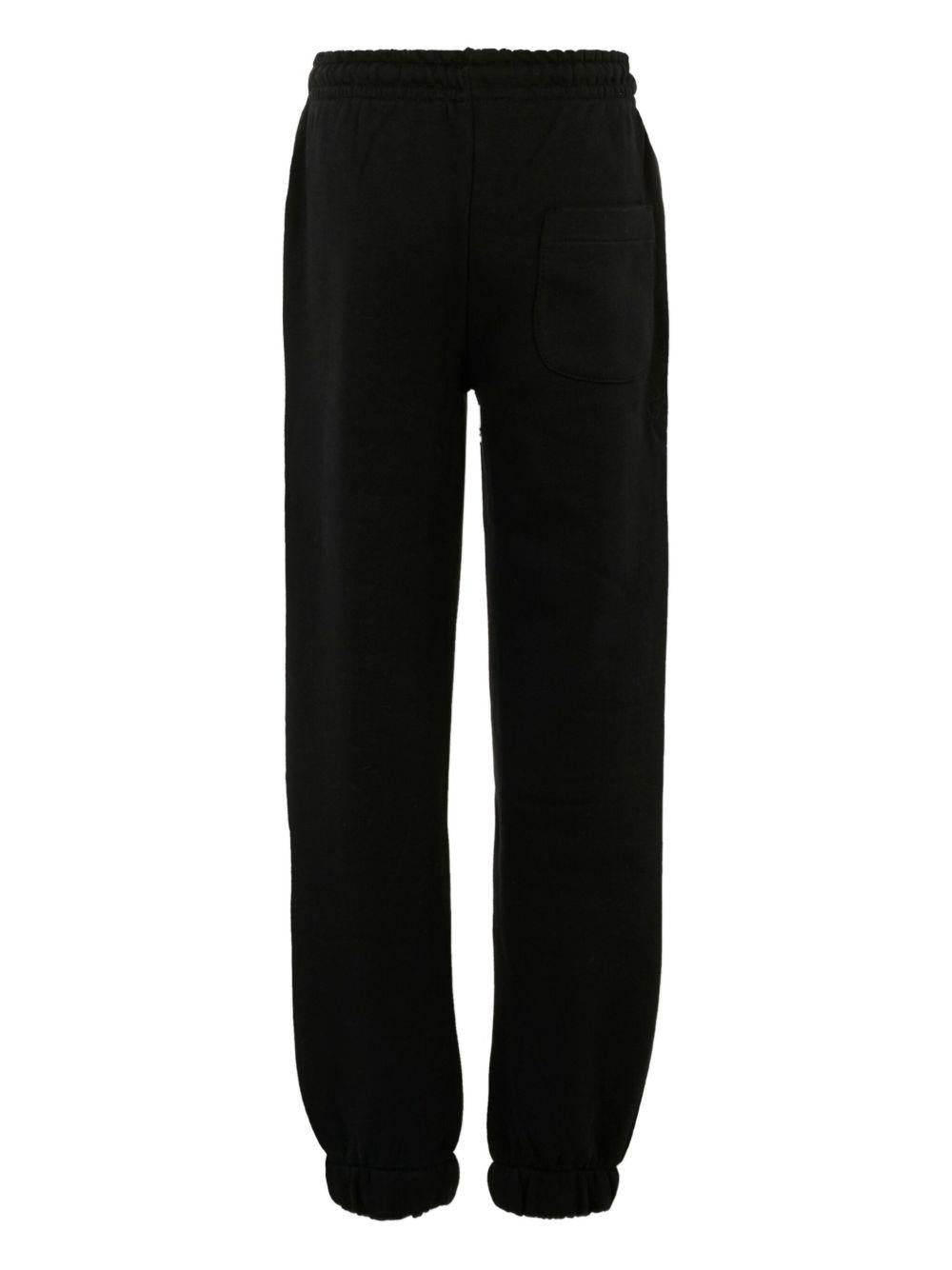 Pantaloni sportivi per bambino MSGM Kids nero con polsini elasticizzati - Rubino Kids