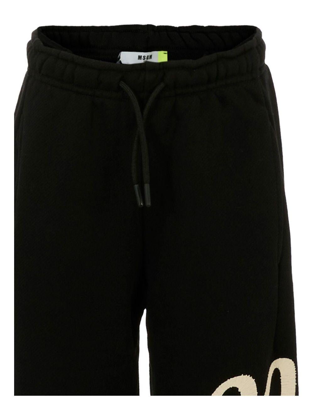 Pantaloni sportivi per bambino MSGM Kids nero con stampa del logo - Rubino Kids