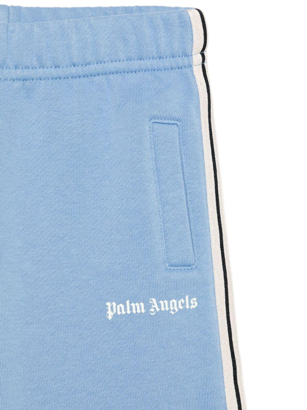 Pantaloni sportivi per bambino Palm Angels Kids azzurri con stampa con logo - Rubino Kids