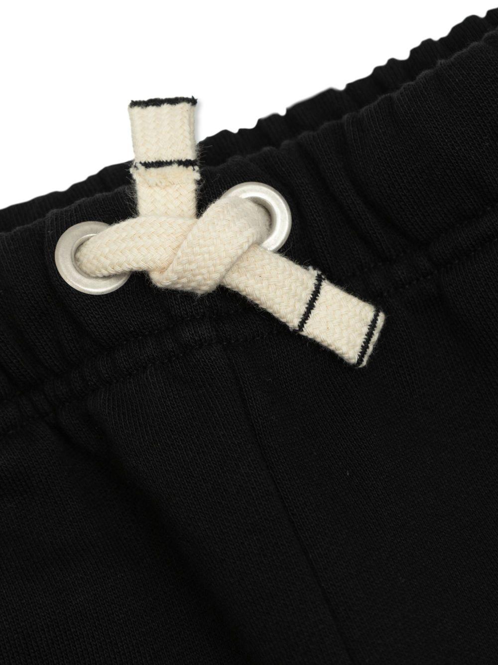 Pantaloni sportivi per bambino Palm Angels Kids neri con logo sul davanti - Rubino Kids