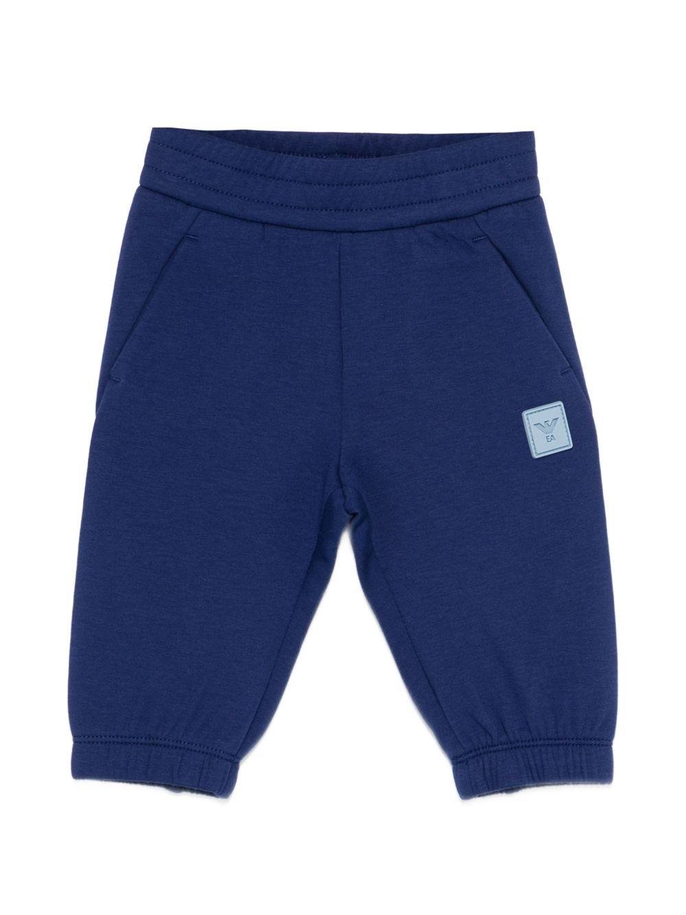 Pantaloni sportivi per neonato Emporio Armani Kids blu con applicazione logo - Rubino Kids
