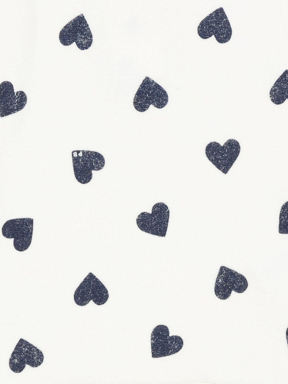 Pigiama per bambina Petit Bateau bianca con stampa a cuore - Rubino Kids