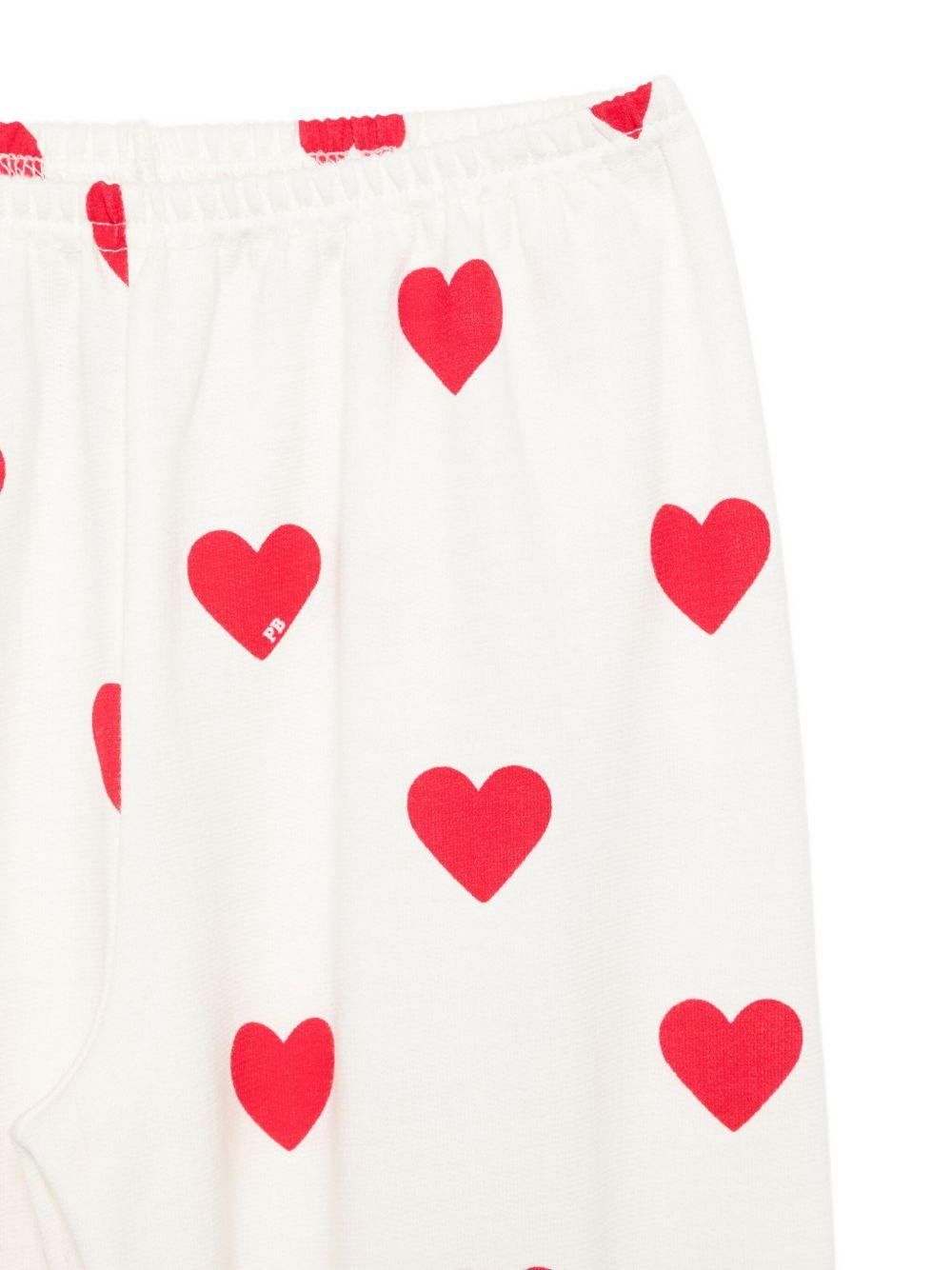 Pigiama per bambina Petit Bateau bianco con stampa a cuori - Rubino Kids