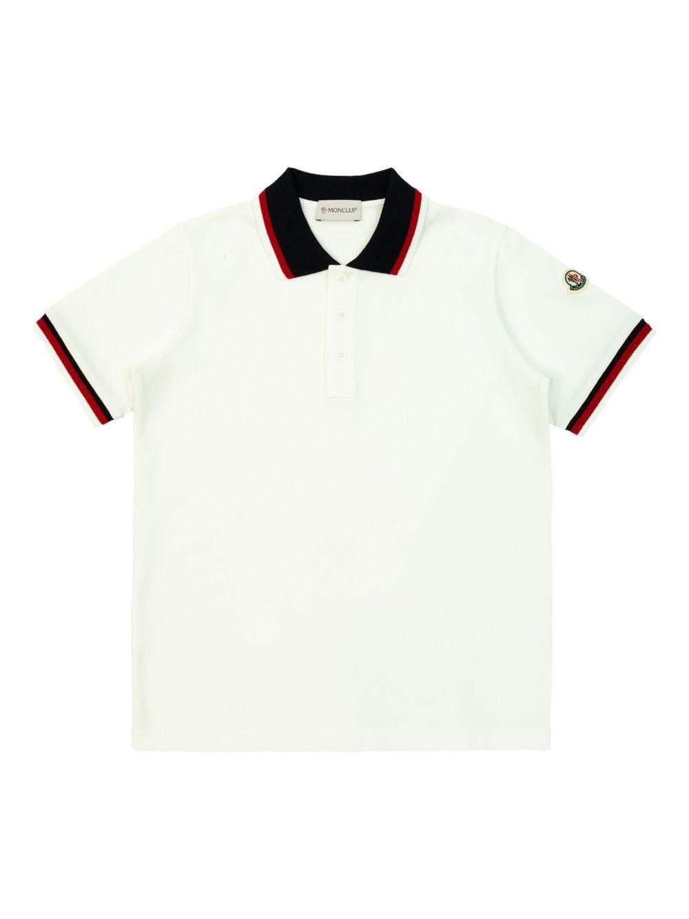 Polo con applicazione logo per bambino Moncler Enfant bianco con abbottonatura frontale corta - Rubino Kids