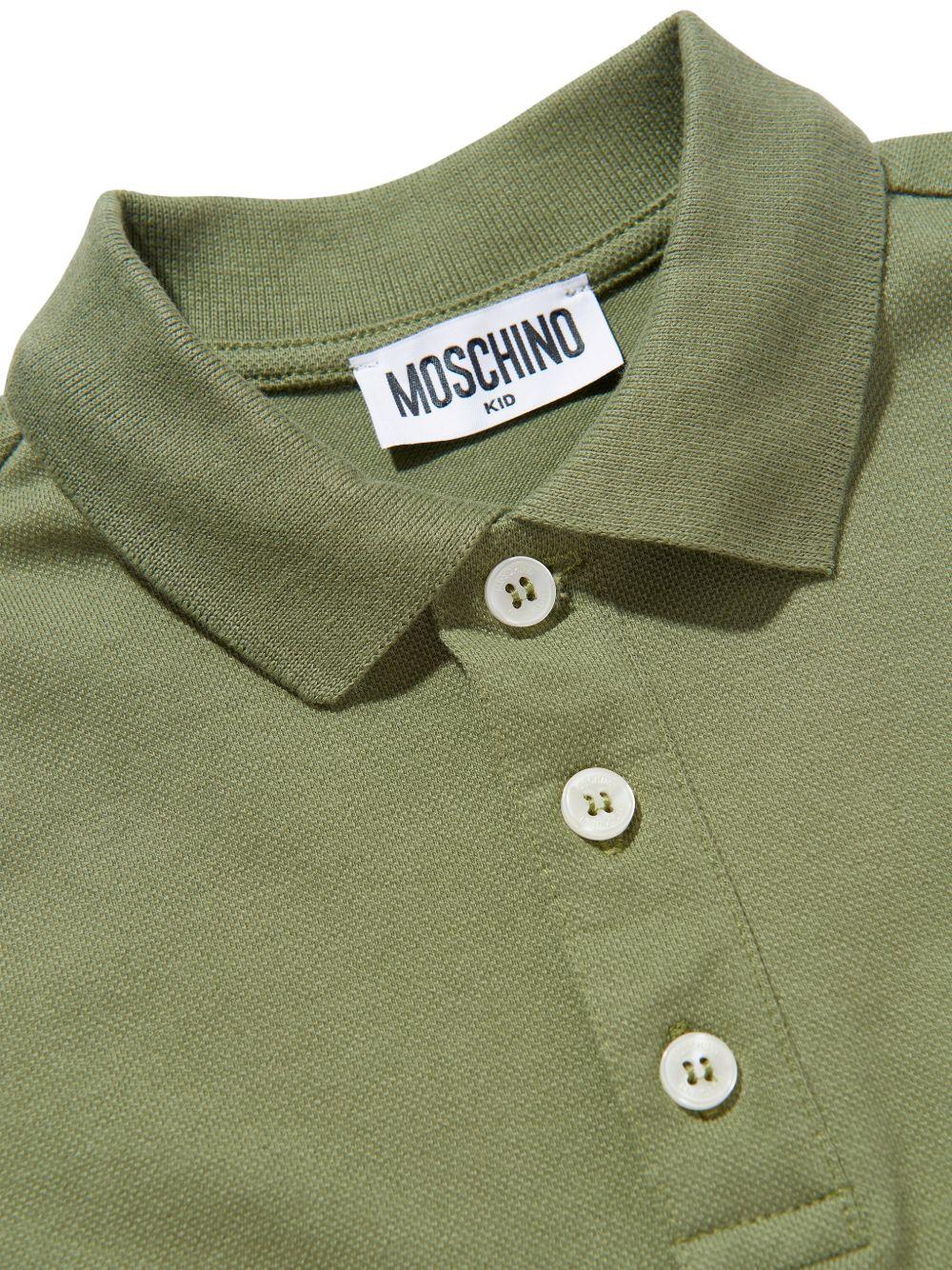 Polo da bambino Moschino Kids verde con stampa orsacchiotto - Rubino Kids