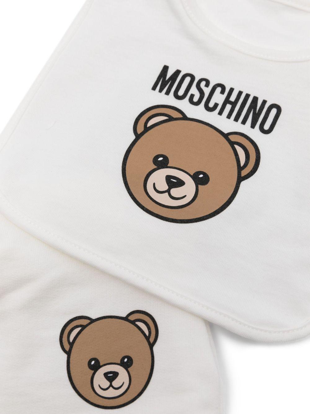 Set berretto e bavaglino Moschino Kids bianco con stampa - Rubino Kids