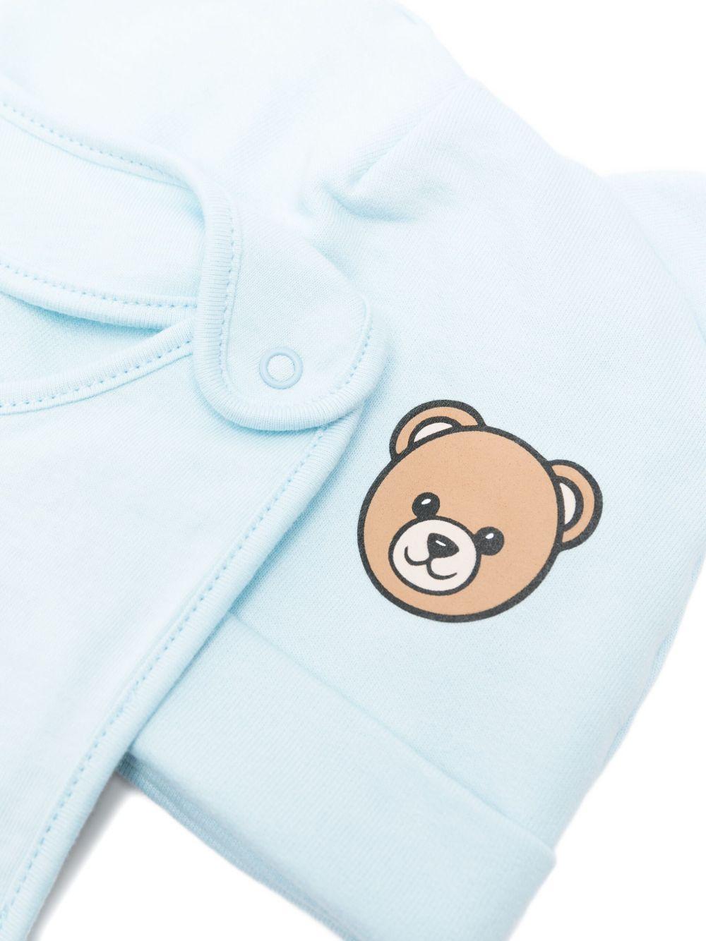 Set berretto e bavaglino per neonato Moschino Kids azzurro con motivo Teddy Bear - Rubino Kids