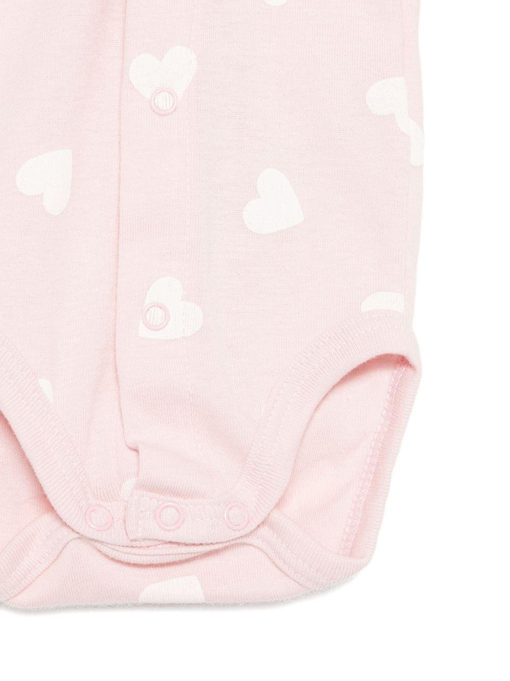Set tutina e cardigan per neonata Petit Bateau rosa con motivo a cuori - Rubino Kids