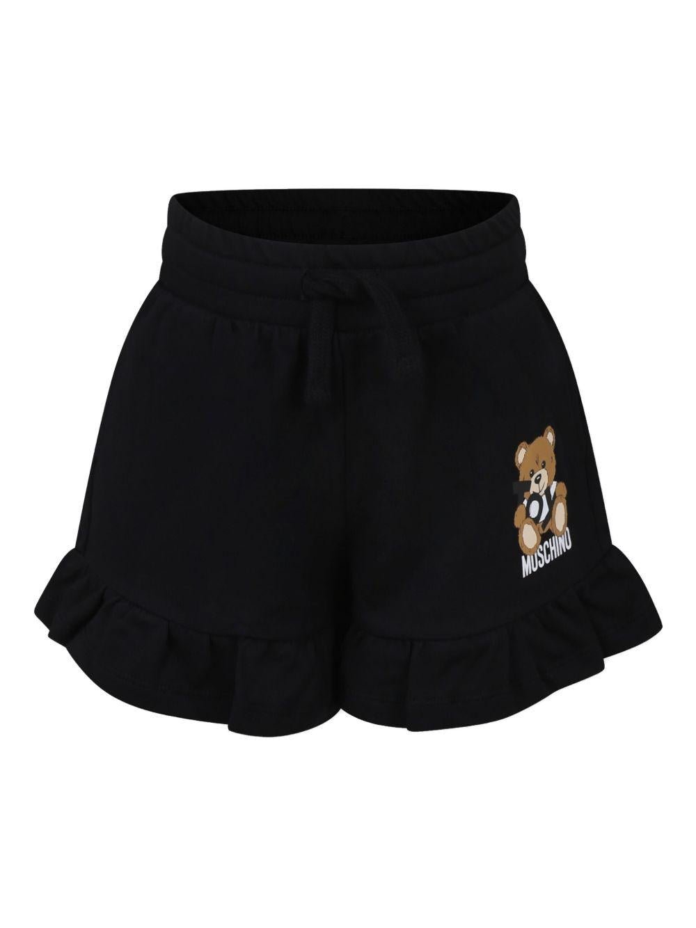 Shorts con motivo Teddy Bear per bambina Moschino Kids nero con logo sulla gamba - Rubino Kids