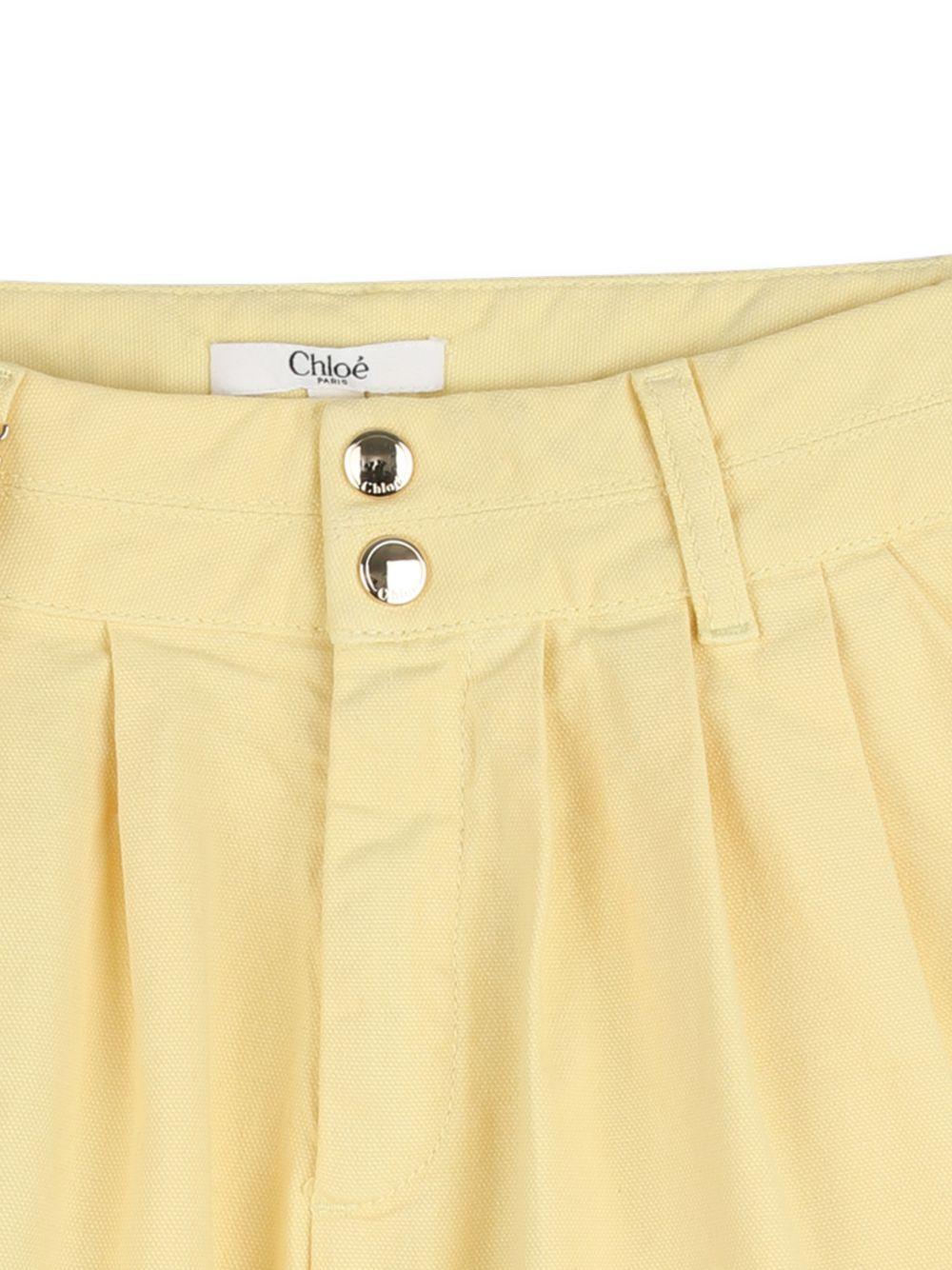 Shorts per bambina Chloé Kids giallo con dettaglio ciondolo - Rubino Kids