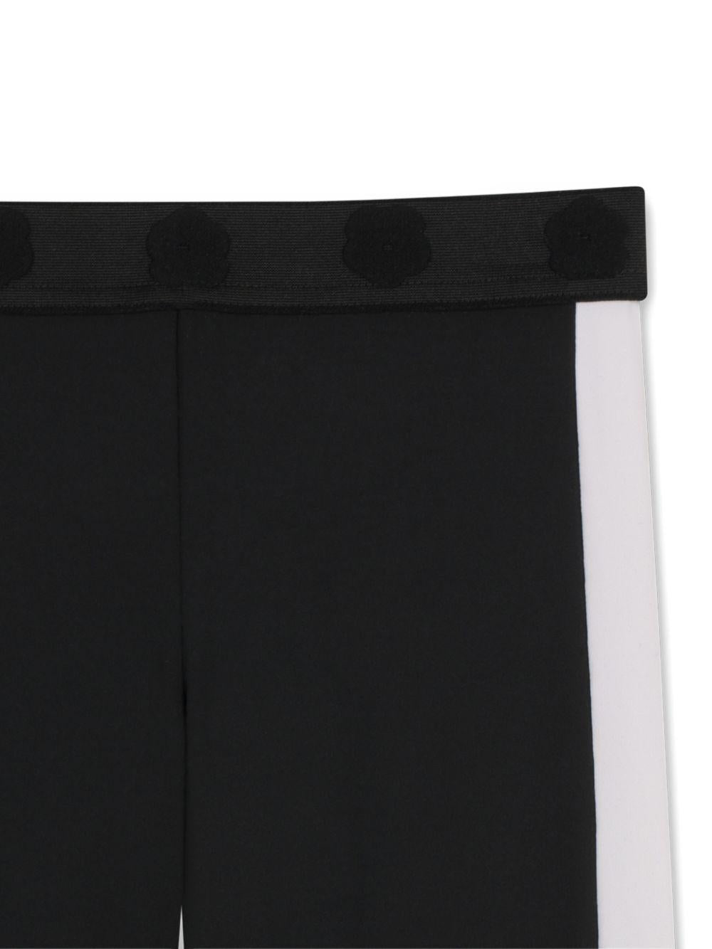 Shorts per bambina Kenzo Kids nero con logo a fiori - Rubino Kids