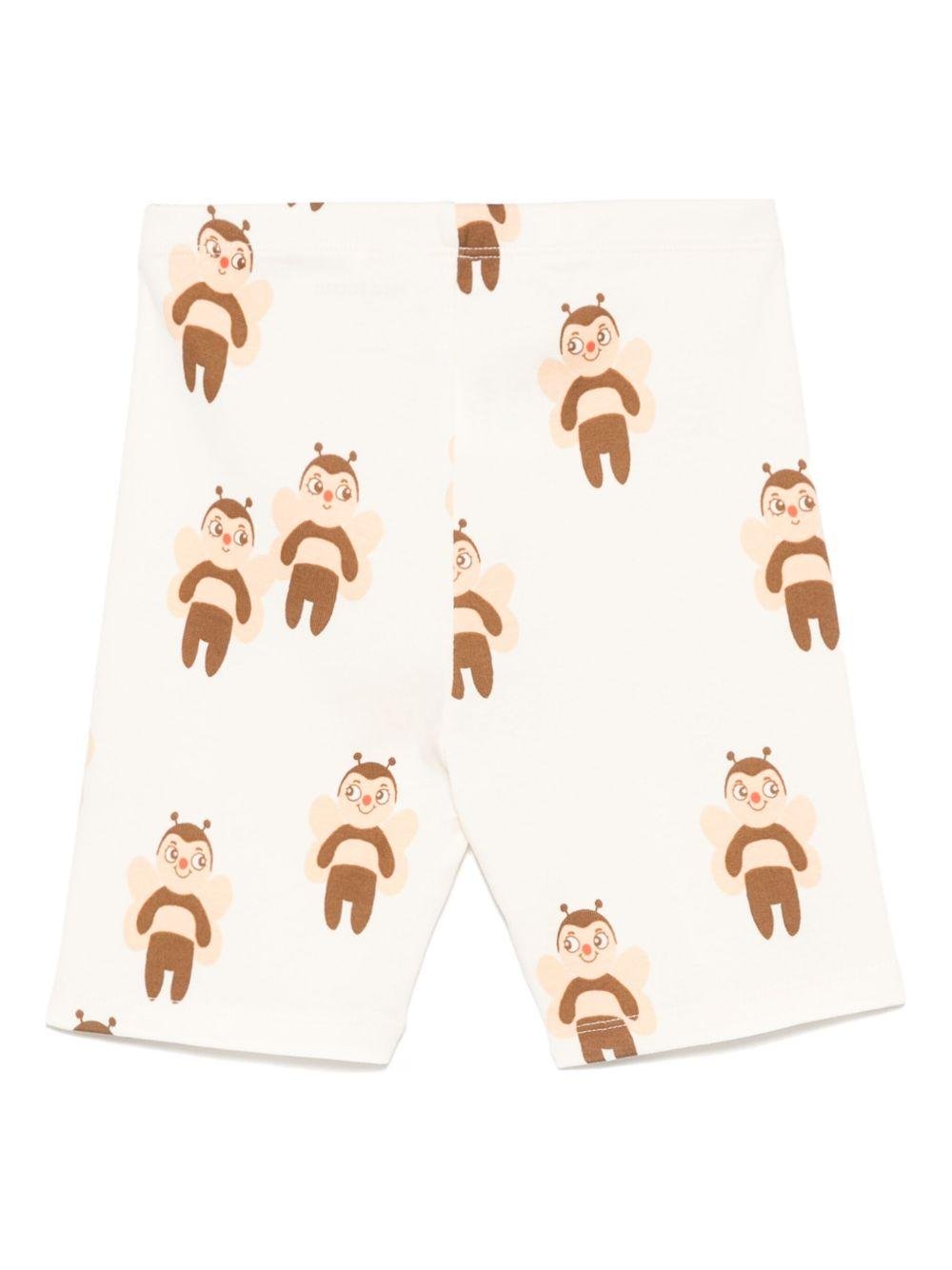 Shorts per bambina Mini Rodini bianco con stampa grafica con lunghezza alla coscia - Rubino Kids