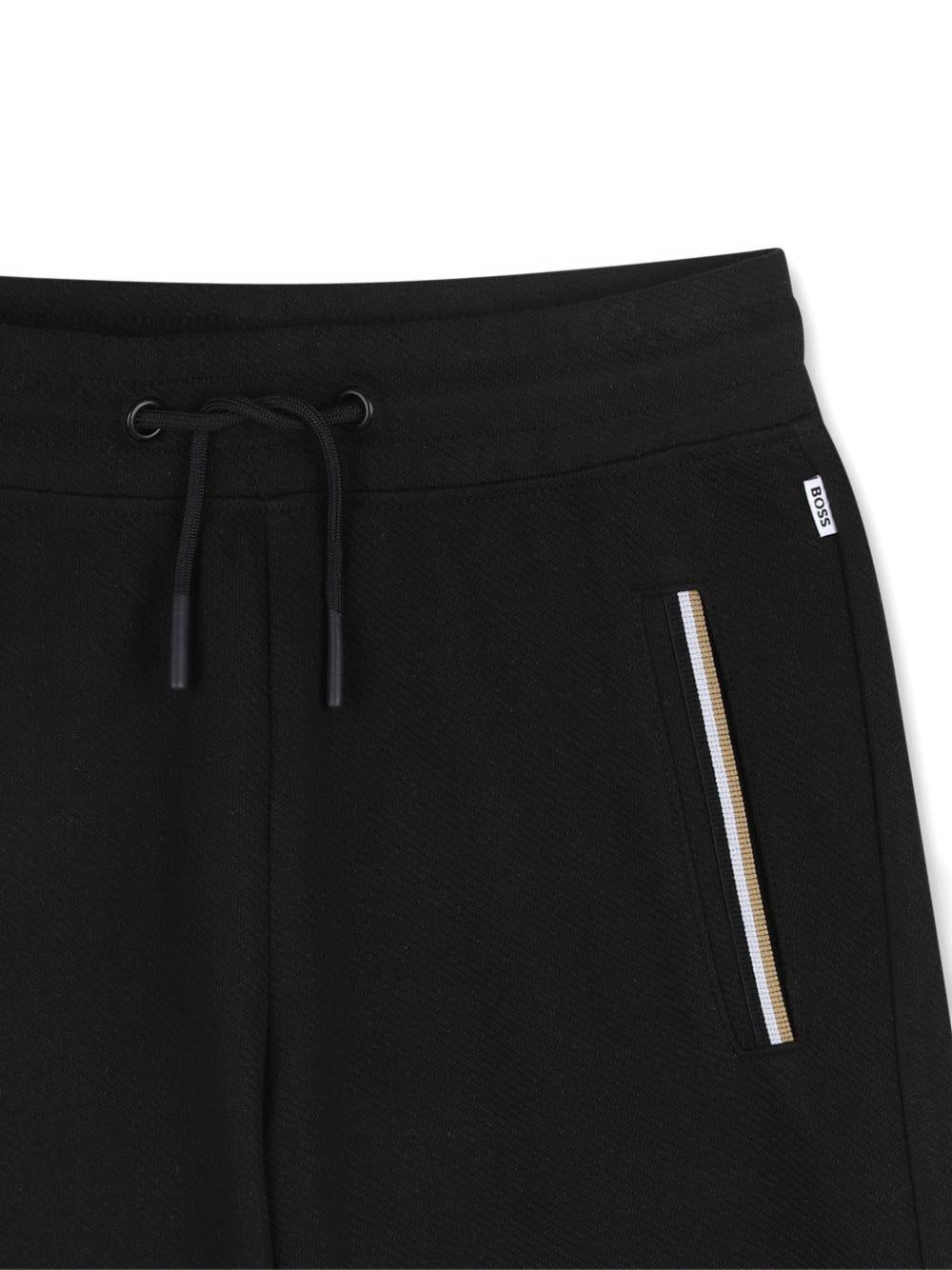 Shorts per bambino Boss Kids nero con dettgali a righe - Rubino Kids