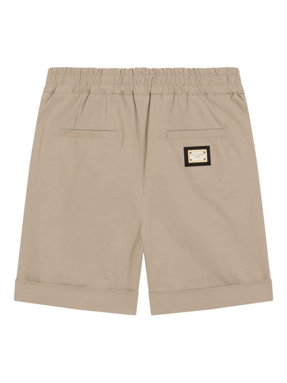 Shorts per bambino Dolce & Gabbana Kids beige con logo posteriore - Rubino Kids