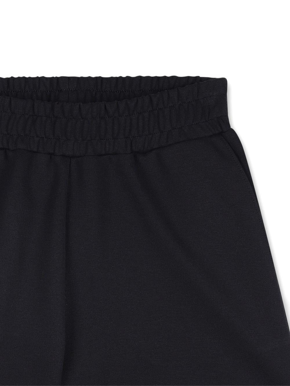 Shorts per bambino Givenchy Kids nero elasticizzato - Rubino Kids