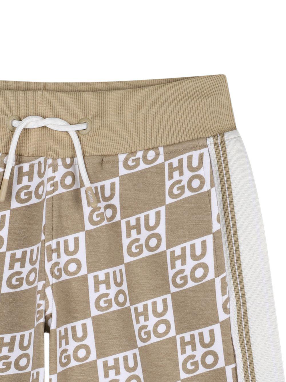 Shorts per bambino Hugo Kids beige con stampa logo all - over - Rubino Kids