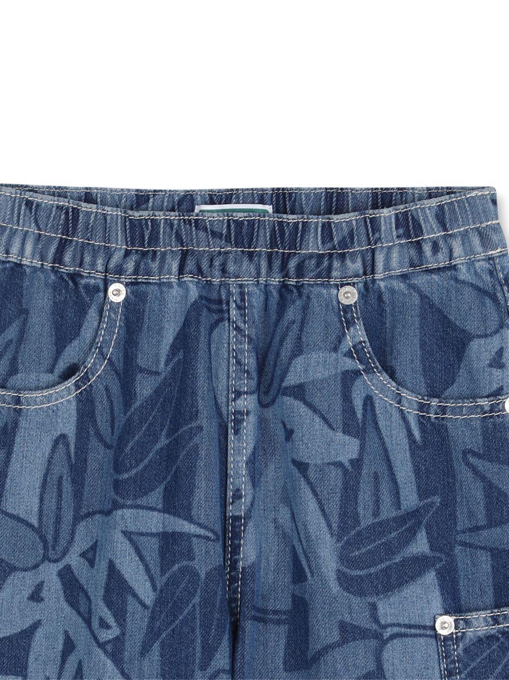 Shorts per bambino Kenzo Kids in denim con stampa all - over - Rubino Kids