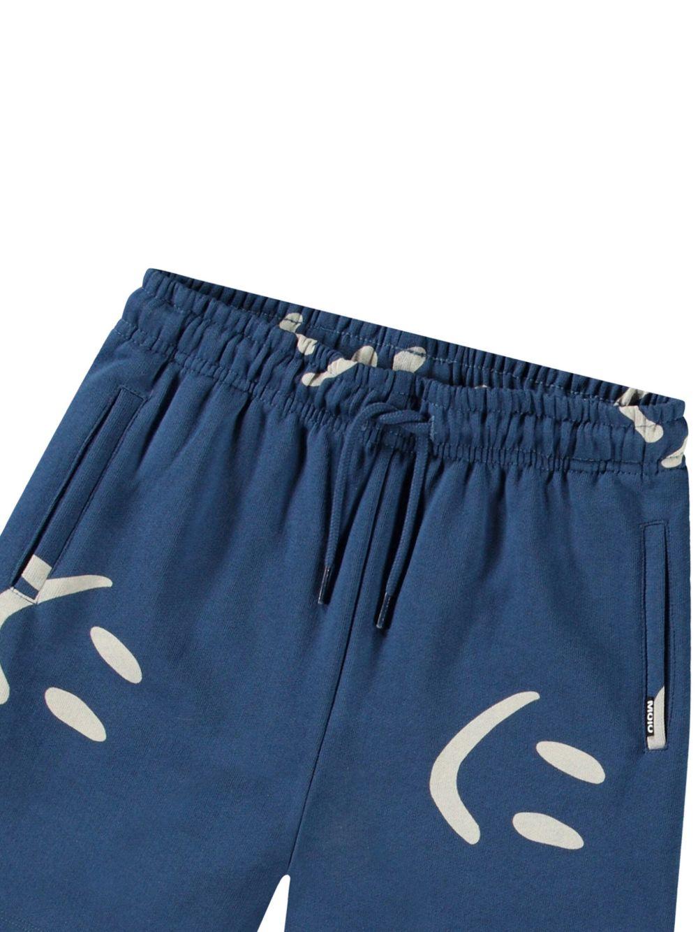 Shorts per bambino Molo Amil blu con stampa smiley all - over - Rubino Kids