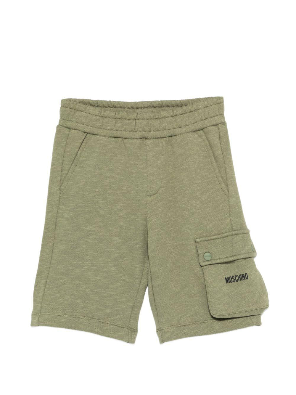 Shorts per bambino Moschino Kids verde con logo sul davanti - Rubino Kids