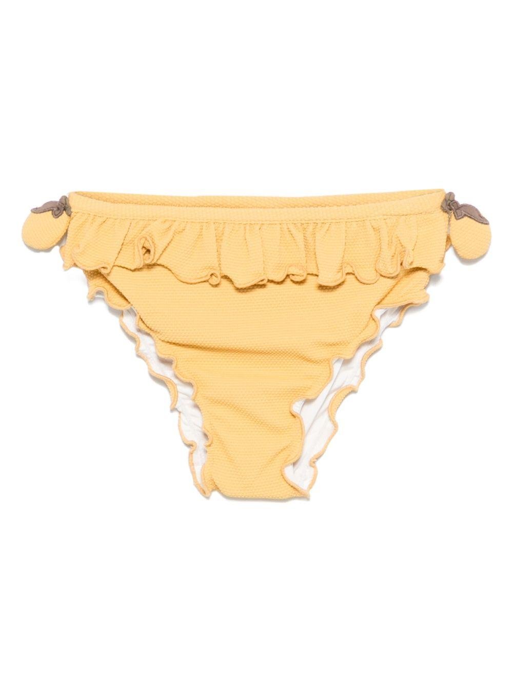 Slip bikini per bambina Donsje Sisi giallo con dettagli con ruches - Rubino Kids