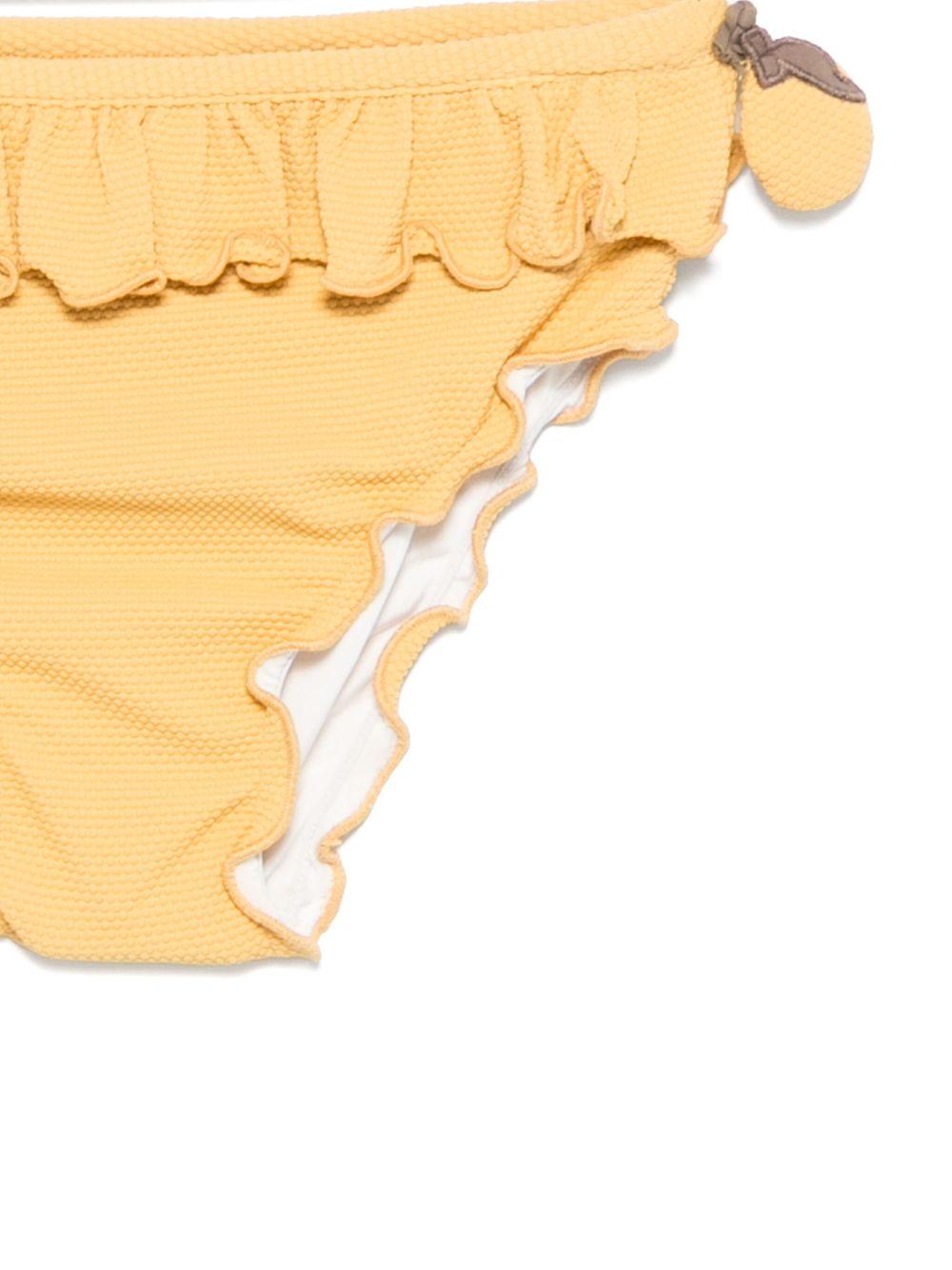 Slip bikini per bambina Donsje Sisi giallo con dettagli con ruches - Rubino Kids