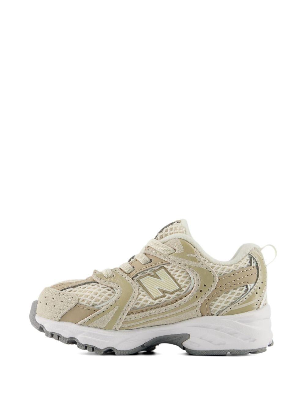 Sneakers 530 per bambini New Balance Kids beige con design a inserti - Rubino Kids