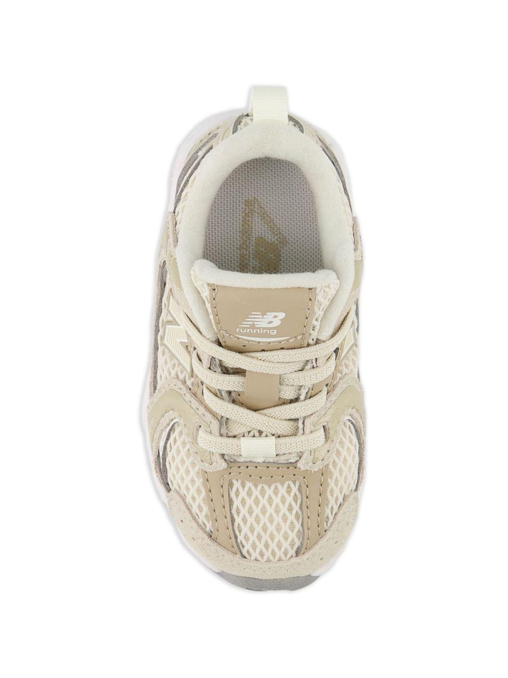 Sneakers 530 per bambini New Balance Kids beige con design a inserti - Rubino Kids