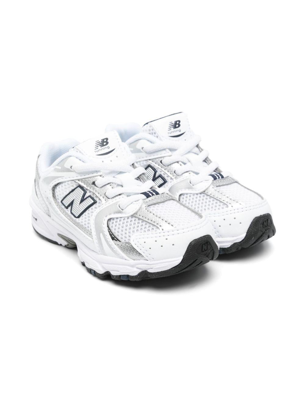 Sneakers 530 per bambini New Balance Kids bianche con inserti grigi - Rubino Kids