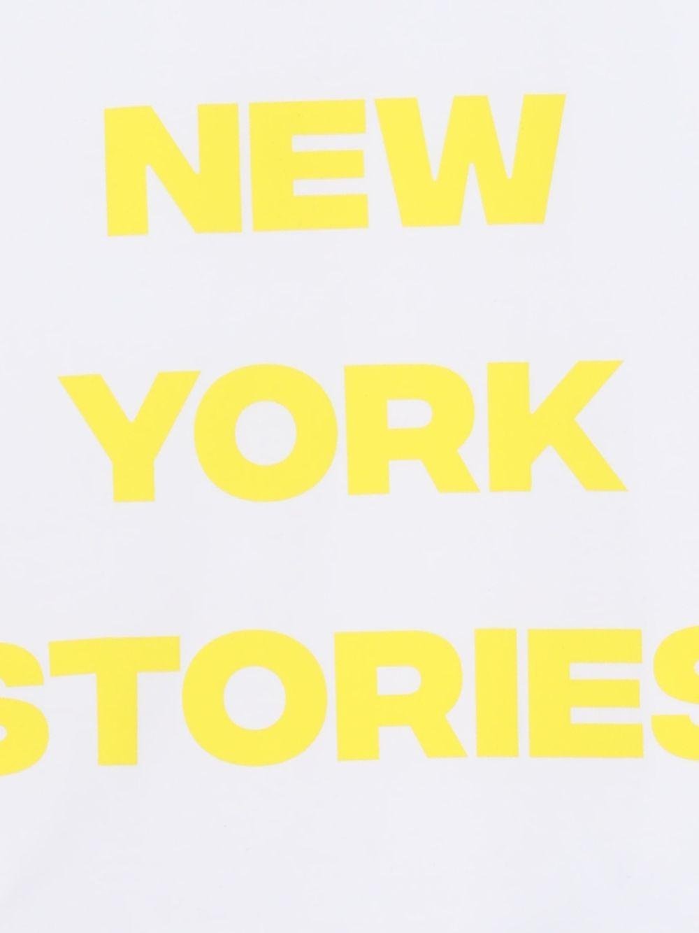 T-shirt per bambina Dkny Kids bianca con scritta sul davanti - Rubino Kids