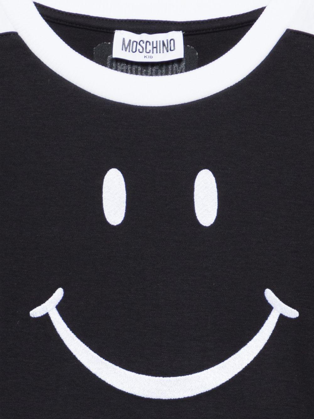 T-shirt per bambino Moschino Kids nera con stampa smile sul davanti - Rubino Kids