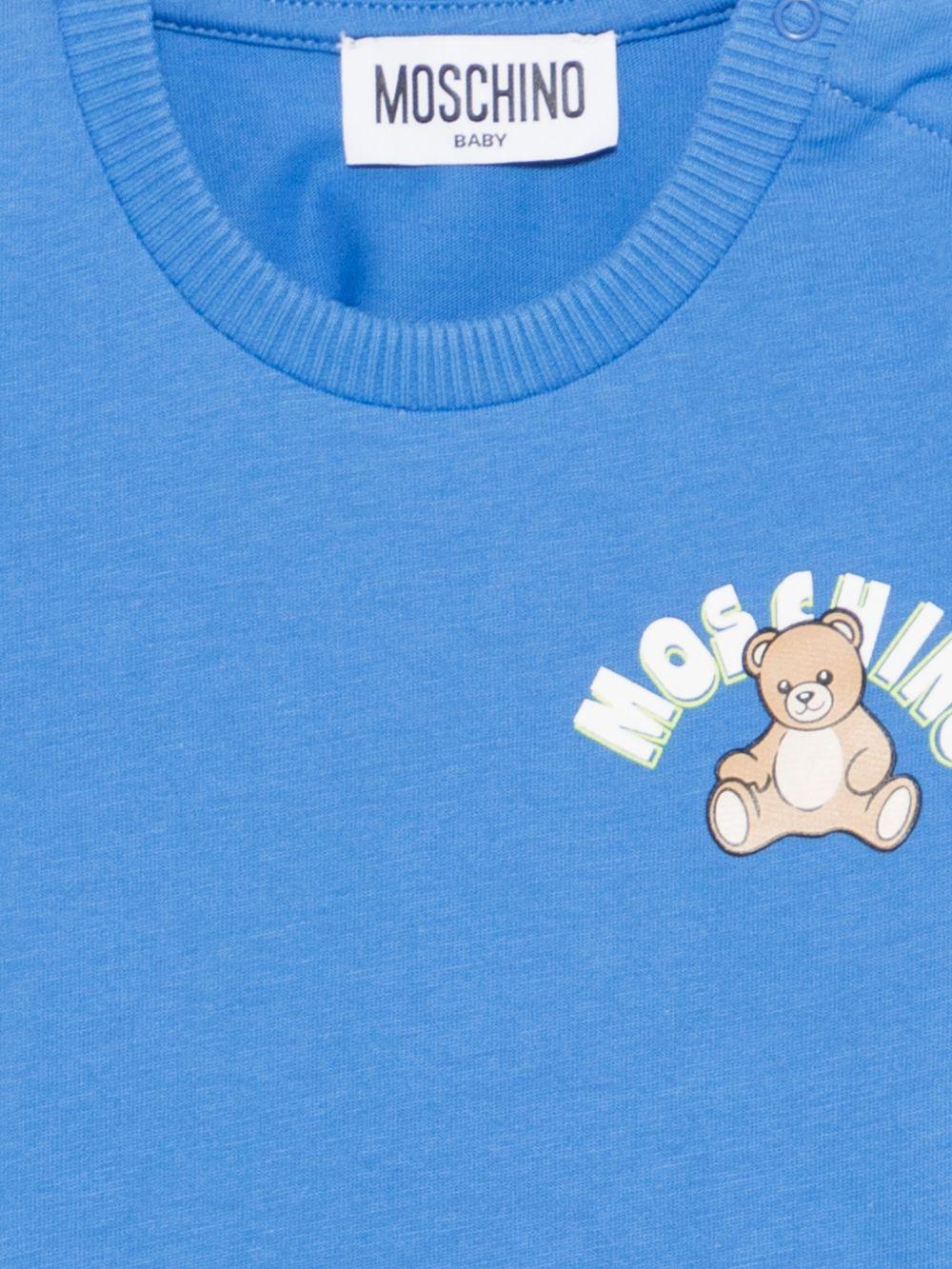 T-shirt per neonati Moschino Kids azzura con stampa Teddy Bear sul davanti - Rubino Kids